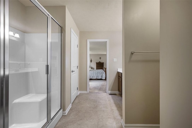 224 Long Ridge Dr, Kennedy Twp, PA 15108 - full bath with a stall shower, ensuite bath, vanity, baseboards, and tile patterned flooring