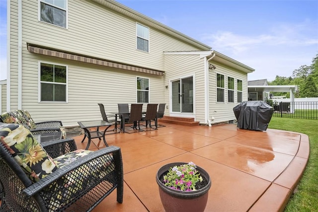 224 Long Ridge Dr, Kennedy Twp, PA 15108 - back of property with a patio and outdoor dining space