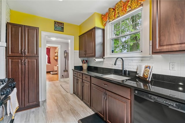 8243 High St, Mccandless, PA 15237 - kitchen featuring black appliances, a sink, backsplash, dark stone counters, and baseboards