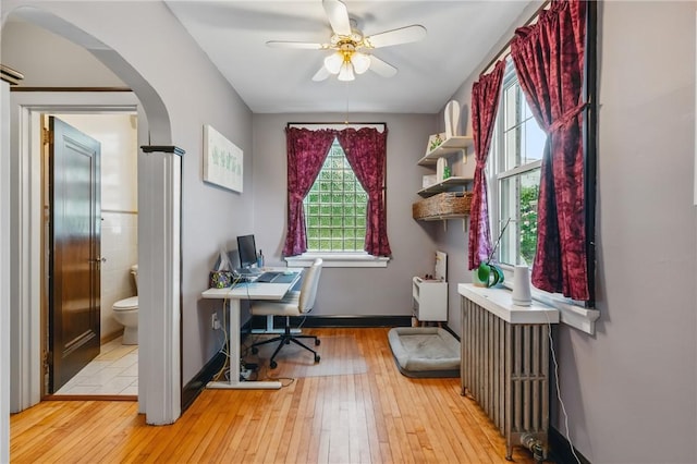 8243 High St, Mccandless, PA 15237 - office space with arched walkways, wood-type flooring, and ceiling fan