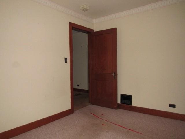 619 W Race St, Somerset Boro, PA 15501 - carpeted empty room featuring baseboards and crown molding