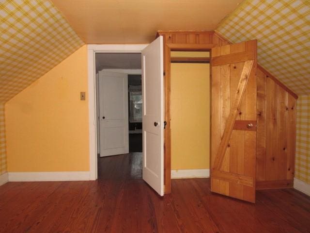 619 W Race St, Somerset Boro, PA 15501 - additional living space featuring baseboards, wood finished floors, and vaulted ceiling
