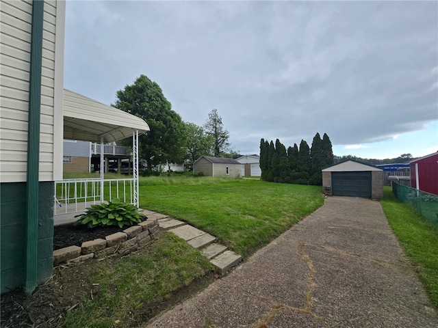 1102 Vermont Ave, White Oak, PA 15131 - view of yard with an outbuilding and a garage
