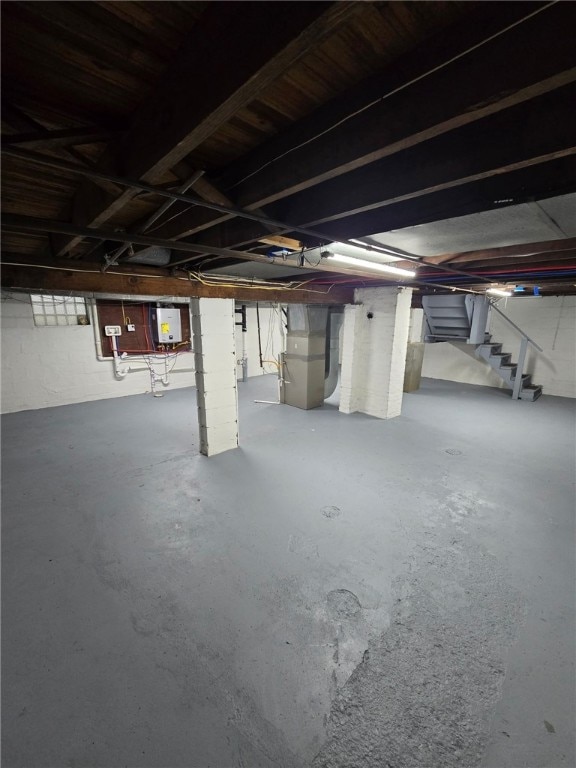 1102 Vermont Ave, White Oak, PA 15131 - unfinished below grade area featuring stairs and water heater