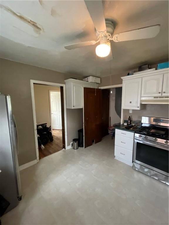 1001 Wible Run Rd, Shaler, PA 15209 - kitchen featuring appliances with stainless steel finishes, under cabinet range hood, white cabinetry, a ceiling fan, and baseboards