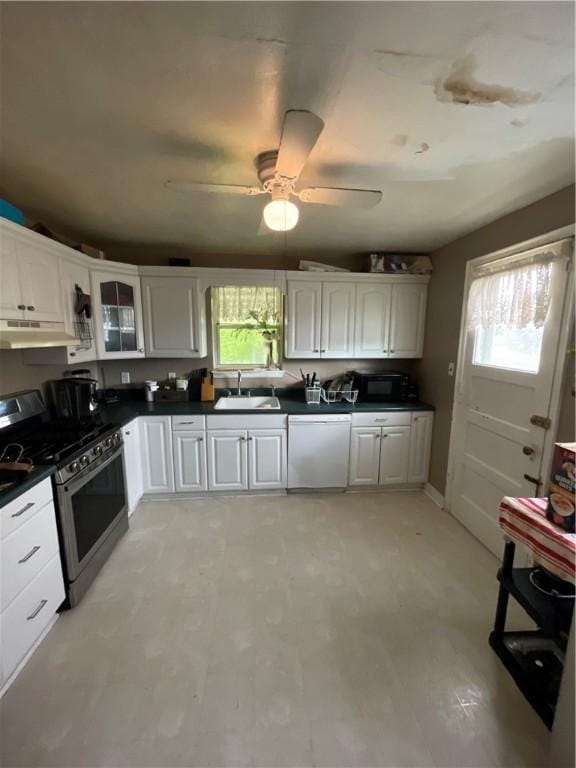 1001 Wible Run Rd, Shaler, PA 15209 - kitchen featuring stainless steel gas range, white dishwasher, a sink, under cabinet range hood, and white cabinetry