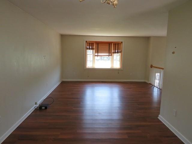 903 Fox Run Cir, Cranberry Twp, PA 16066 - unfurnished room featuring wood finished floors, baseboards, and a chandelier