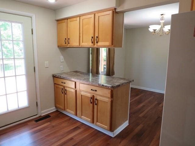 903 Fox Run Cir, Cranberry Twp, PA 16066 - kitchen featuring a peninsula, dark wood-style floors, a chandelier, stone counters, and light brown cabinets