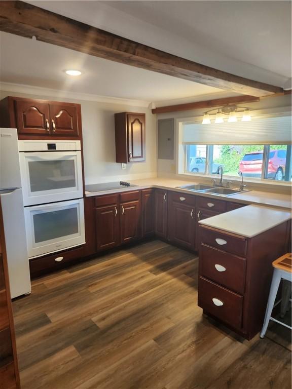 336 Fruit St, Waynsbrg/Frankln Twp, PA 15370 - kitchen featuring a sink, dark wood-style flooring, white appliances, beam ceiling, and light countertops