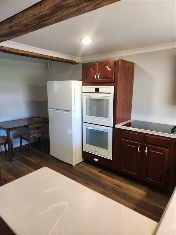 336 Fruit St, Waynsbrg/Frankln Twp, PA 15370 - kitchen featuring white appliances, crown molding, light countertops, dark wood finished floors, and recessed lighting