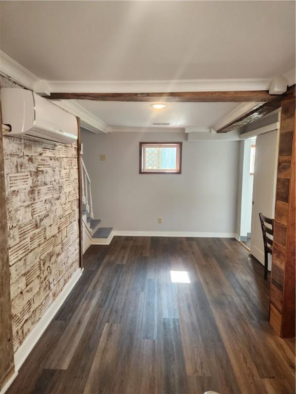 336 Fruit St, Waynsbrg/Frankln Twp, PA 15370 - basement featuring stairs, dark wood-style flooring, baseboards, and ornamental molding