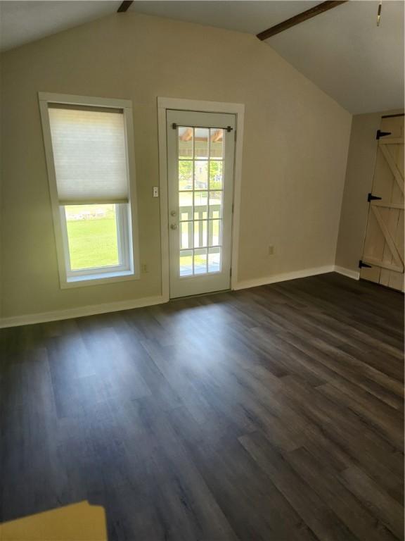 336 Fruit St, Waynsbrg/Frankln Twp, PA 15370 - unfurnished living room featuring baseboards and dark wood-style flooring