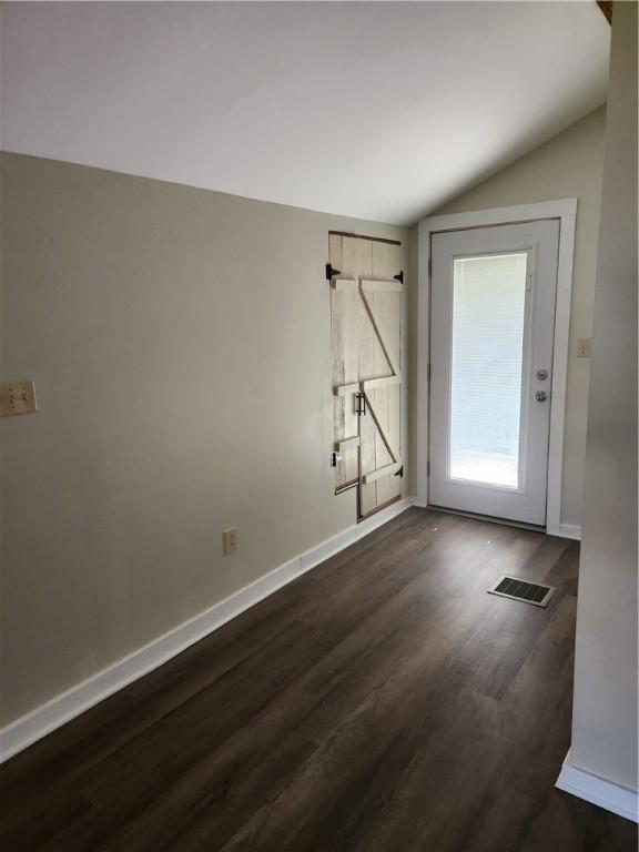 336 Fruit St, Waynsbrg/Frankln Twp, PA 15370 - empty room with vaulted ceiling, dark wood finished floors, and baseboards
