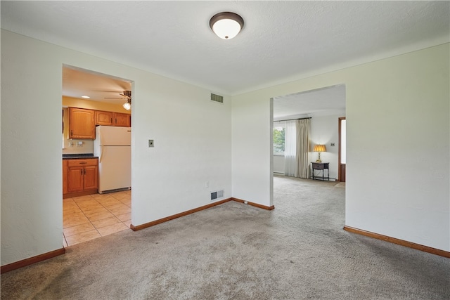 10539 Roseway Blvd, North Huntingdon, PA 15642 - empty room featuring light colored carpet, a ceiling fan, and baseboards