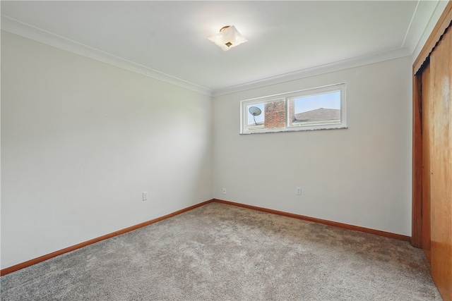 10539 Roseway Blvd, North Huntingdon, PA 15642 - unfurnished bedroom with ornamental molding, carpet flooring, baseboards, and a closet