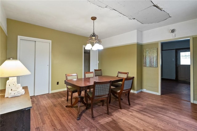 99 River Ave, Natrona, PA 15065 - dining area featuring wood finished floors and a chandelier