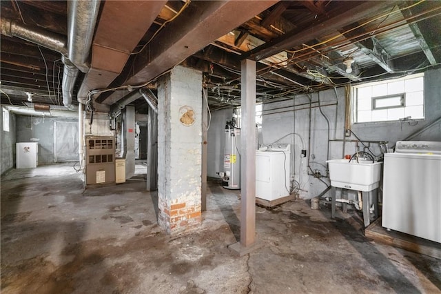99 River Ave, Natrona, PA 15065 - below grade area with heating unit, water heater, and separate washer and dryer