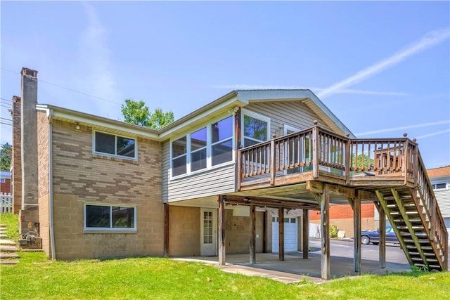3410 E Stag Dr, West Deer, PA 15044 - rear view of property with a wooden deck, a lawn, stairway, a patio area, and brick siding