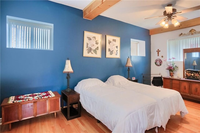226-228 S Washington St Unit 226, City Of But Se, PA 16001 - bedroom featuring wood finished floors, beamed ceiling, and ceiling fan