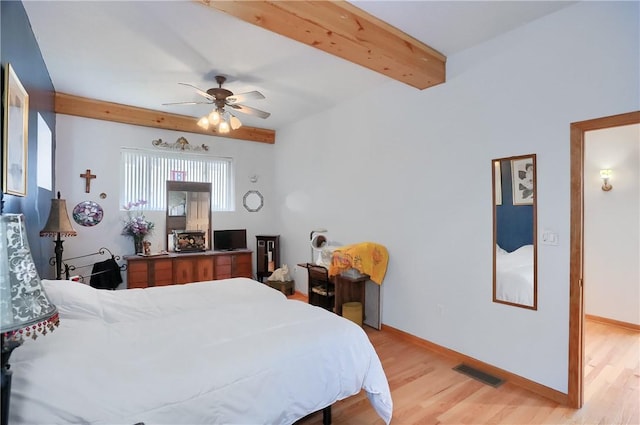 226-228 S Washington St Unit 226, City Of But Se, PA 16001 - bedroom with light wood-style flooring, baseboards, beamed ceiling, and a ceiling fan