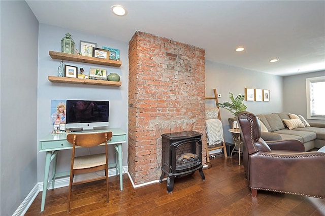 1921 Jane St, South Side, PA 15203 - living area with wood finished floors, a wood stove, and recessed lighting
