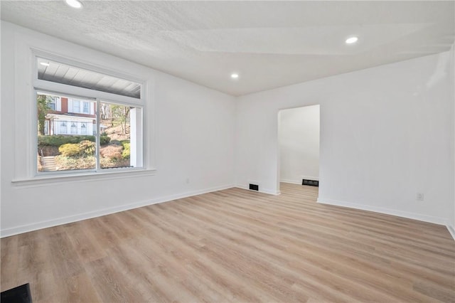 220 Dewey St, Edgewood, PA 15218 - unfurnished room with light wood-style floors, recessed lighting, and baseboards