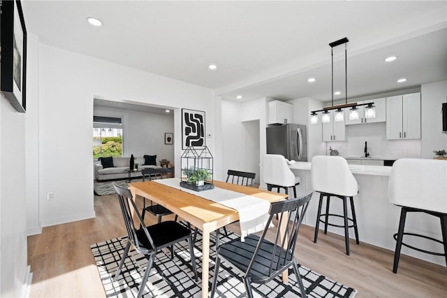 220 Dewey St, Edgewood, PA 15218 - dining space featuring light wood finished floors and recessed lighting