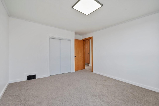 220 Dewey St, Edgewood, PA 15218 - unfurnished bedroom with carpet, a closet, and baseboards
