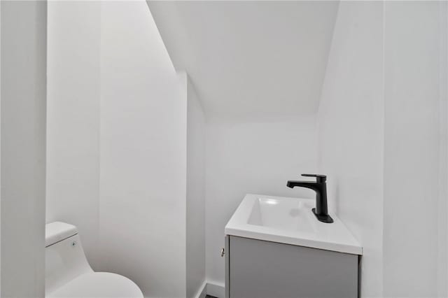 220 Dewey St, Edgewood, PA 15218 - half bathroom featuring vanity and toilet