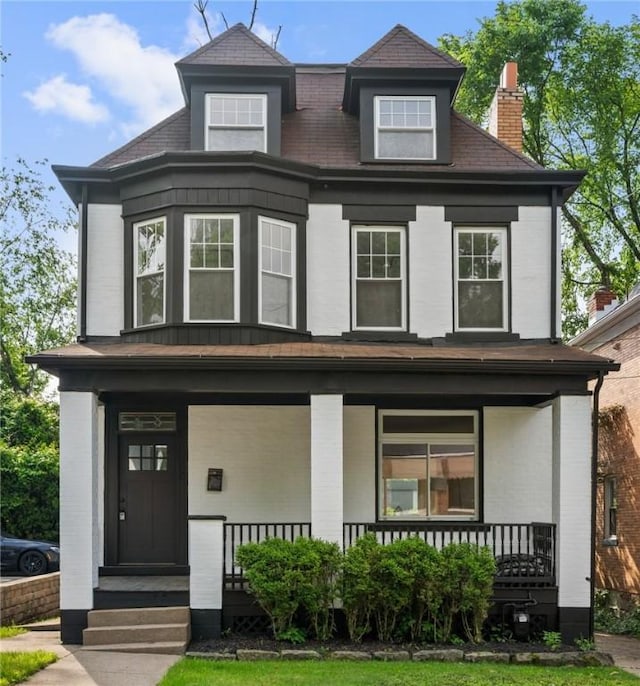 220 Dewey St, Edgewood, PA 15218 - view of front facade with a porch and a chimney
