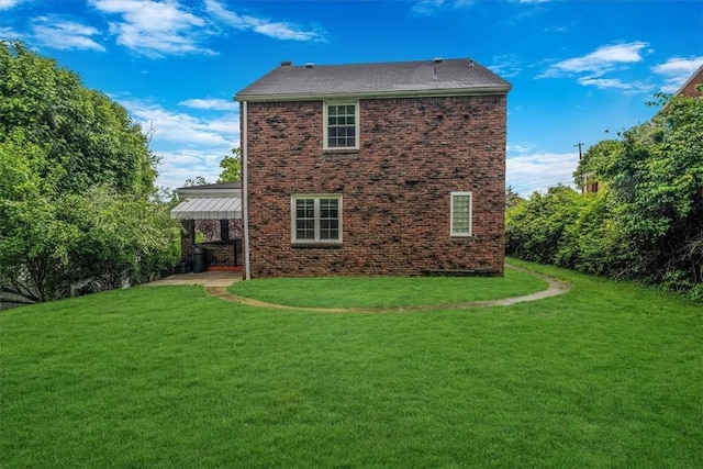 142 Slater Dr, Pleasant Hills, PA 15236 - back of property featuring a lawn and brick siding