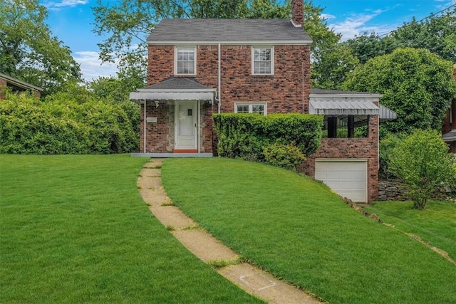 142 Slater Dr, Pleasant Hills, PA 15236 - view of front of home with brick siding, a front lawn, a chimney, a garage, and driveway