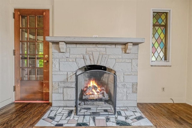 142 Slater Dr, Pleasant Hills, PA 15236 - detailed view of wood finished floors, a fireplace, and baseboards
