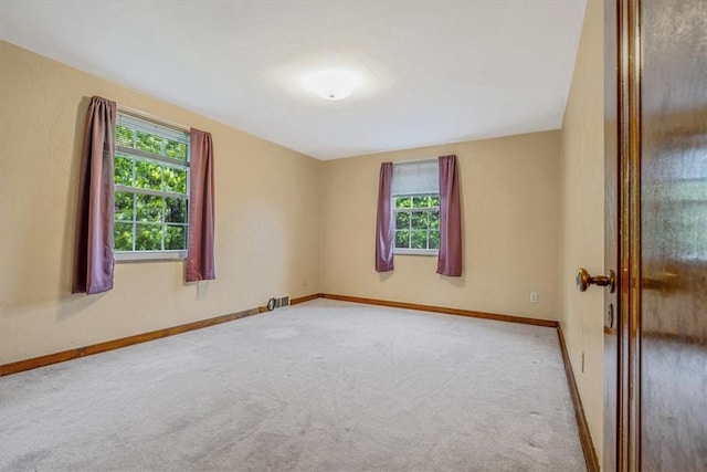 142 Slater Dr, Pleasant Hills, PA 15236 - carpeted empty room featuring healthy amount of natural light and baseboards