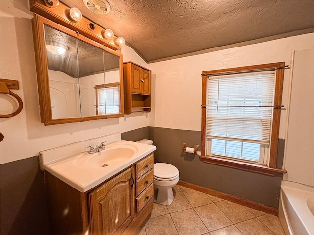 2701 Lafayette St, Mckeesport, PA 15132 - full bath with vanity, toilet, a bath, a textured ceiling, and tile patterned floors
