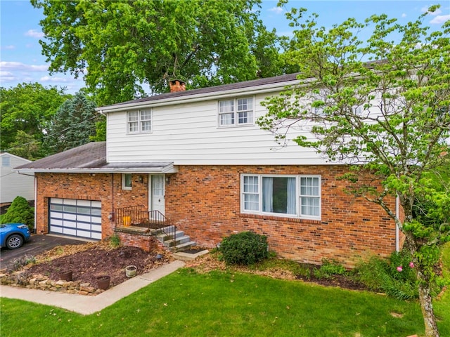 48 Green Crescent Dr, South Strabane, PA 15301 - view of front of property featuring brick siding, a chimney, a front lawn, and asphalt driveway