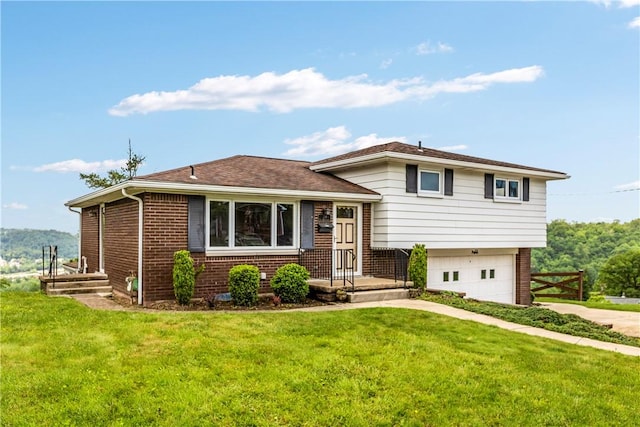 719 12th St, Pitcairn, PA 15140 - tri-level home with brick siding, a garage, and driveway