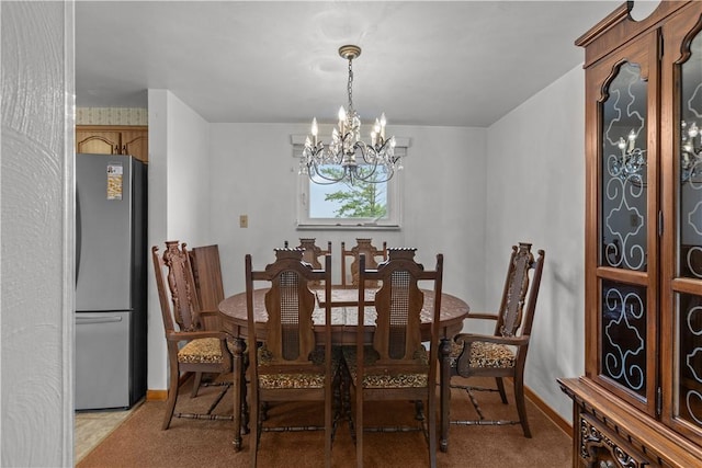 719 12th St, Pitcairn, PA 15140 - dining area with a chandelier, baseboards, and light colored carpet