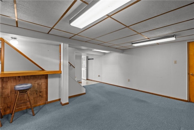 719 12th St, Pitcairn, PA 15140 - finished below grade area with carpet floors, baseboards, and stairway