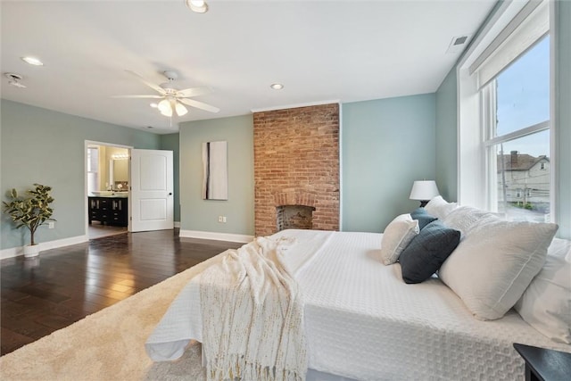 5822 Rippey St, East Liberty, PA 15206 - bedroom with hardwood / wood-style flooring, baseboards, recessed lighting, a fireplace, and ceiling fan