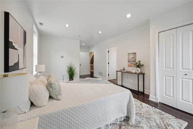 5822 Rippey St, East Liberty, PA 15206 - bedroom featuring dark wood-style flooring, a closet, recessed lighting, and baseboards