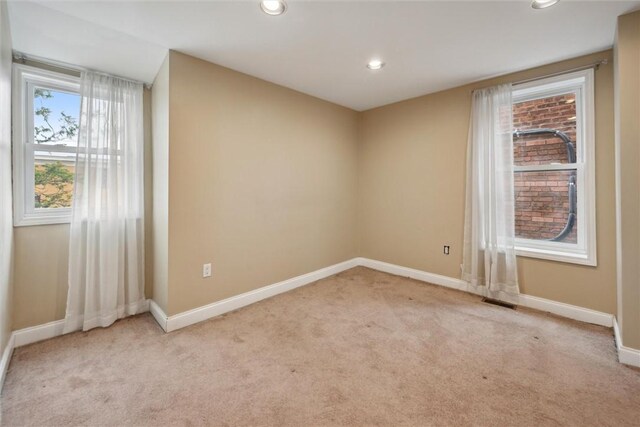 5822 Rippey St, East Liberty, PA 15206 - spare room with light carpet, baseboards, and recessed lighting