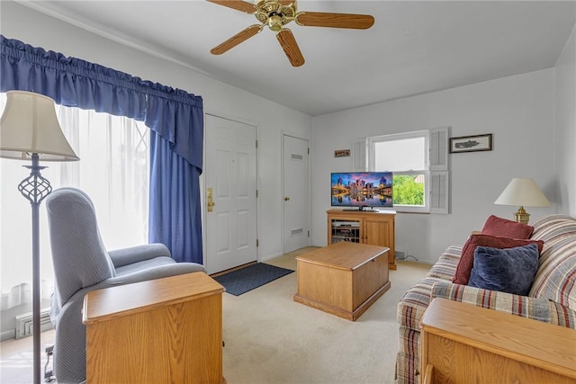 332 Division Ln, Vanport, PA 15009 - living area with light colored carpet and a ceiling fan