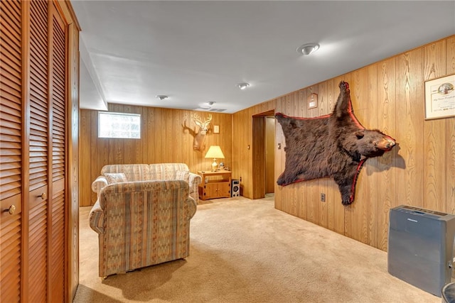 332 Division Ln, Vanport, PA 15009 - living room featuring wooden walls and carpet floors