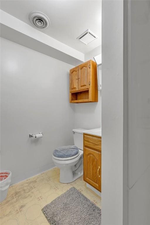 332 Division Ln, Vanport, PA 15009 - bathroom featuring toilet and vanity