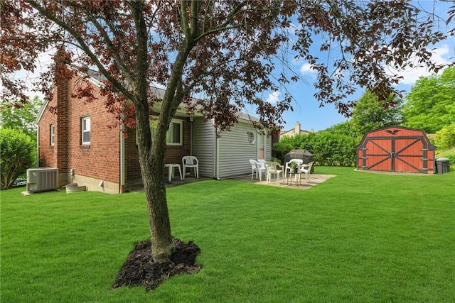 332 Division Ln, Vanport, PA 15009 - view of grassy yard featuring a patio area and central AC