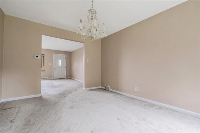 115 Norrington Dr, South Park, PA 15236 - spare room featuring light colored carpet, a chandelier, and baseboards