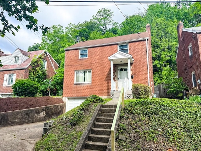 3021 Myer Blvd, Mckeesport, PA 15132 - view of front of property featuring an attached garage and brick siding