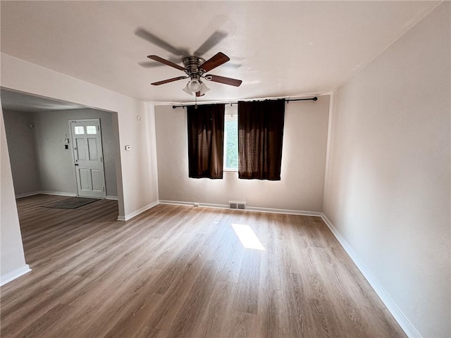 3021 Myer Blvd, Mckeesport, PA 15132 - empty room featuring wood finished floors, baseboards, and a ceiling fan