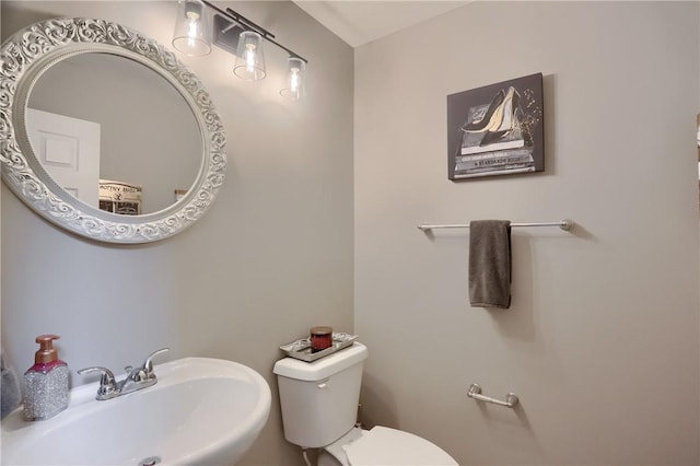 8014 Maureen Dr, Cranberry Twp, PA 16066 - half bathroom featuring a sink and toilet